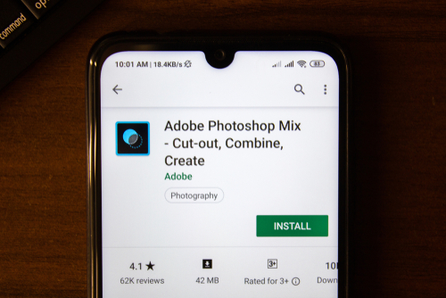 Adobe Photoshop Mix app on the display of smartphone.